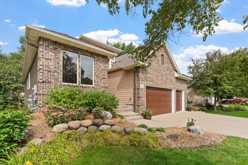 Lovely landscaped home with private setting in demand Deacons Walk neighborhood near TPC