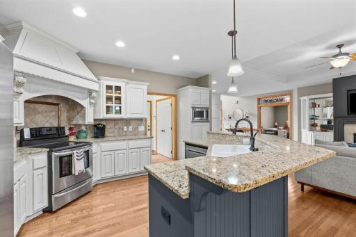 Incredible kitchen with amazing finishes including loads of granite, designer backsplash & top of the line stainless appliances