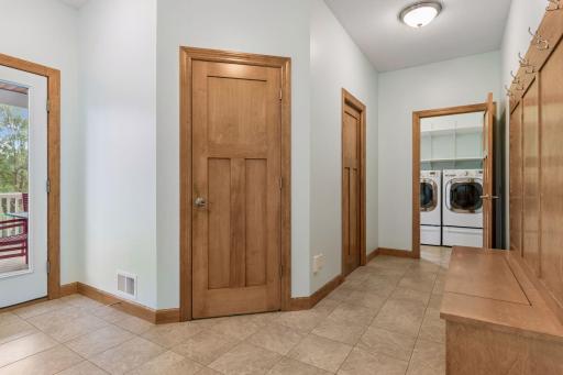 Mud roon with walk-in pantry & coat closet, and main floor laundry room.jpg