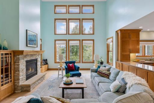 Wall of windows with remote controlled solar window treatments.JPG
