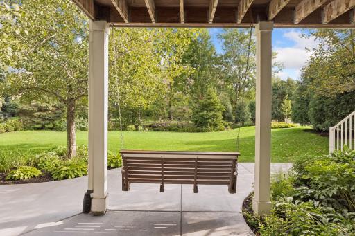 Enjoy your tranquil backyard from this swing.jpg
