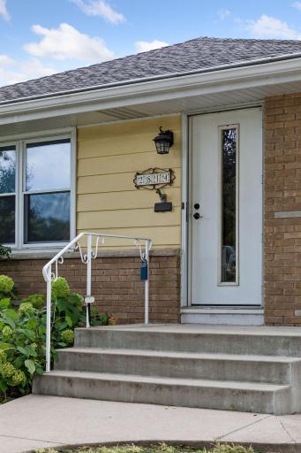 Close up of the generous front stoop. Note the adorable tile address numbers!