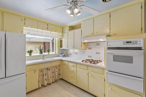 Love the garden window and generous counter space around the sink and cooktop.