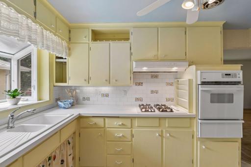 That garden window helps to make the kitchen feel so spacious. Window faces South so perfect for growing those fresh herbs. Imagine reaching over to snip some basil or thyme.