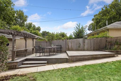 I had the privilege of attending parties in this yard. It was so adorable. The upper deck held a screen house and the grilling was done under the pergola off the garage. Hopefully the decks can be salvaged as they are engineered decking.