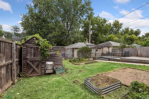 The little potting shed has been invaded by vines. Hope the new buyer can resurrect it. You can get a better idea of how spacious this yard is.