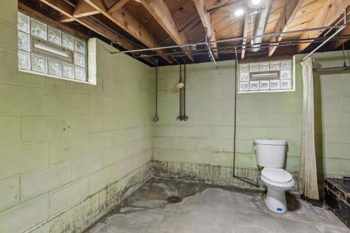 No, a toilet in the basement is convenient but even this newer high efficiency one doesn't count as a bath in my book. However you are 1/3 closer to having at least a three quarter basement bath.