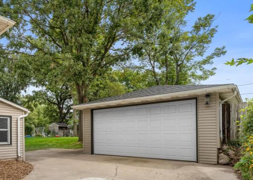 HUGE double deep garage with room for 3rd or even 4th car OR the extra space could be used as a large workshop. Furnace in garage has not been used for the last few years, but did work at one time.