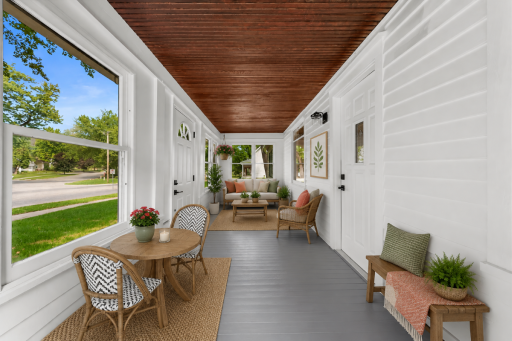 Large front porch which has been fully repainted - Virtually staged image!