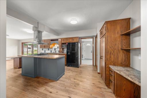 Large Kitchen with ample countertops and cabinet storage.