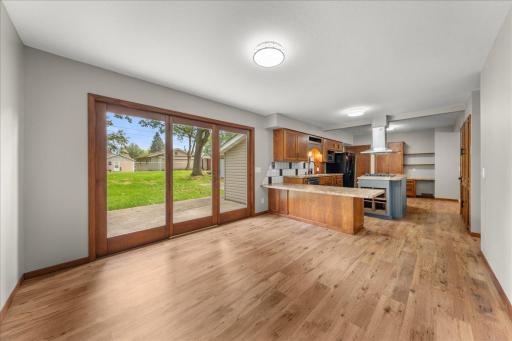 Final view of the kitchen from cozy family room looking out into back yard!