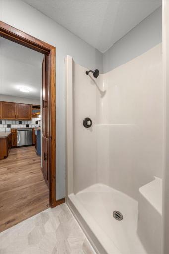 3/4 Bath - view of shower looking back out into hallway/Kitchen area.