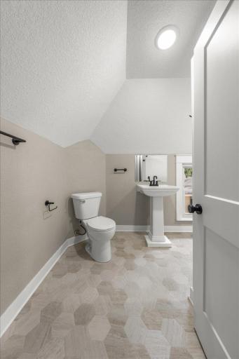 Upper Level Full Bathroom - with new vinyl floors, toilet, pedestal sink, faucet, mirror, accessories & more!