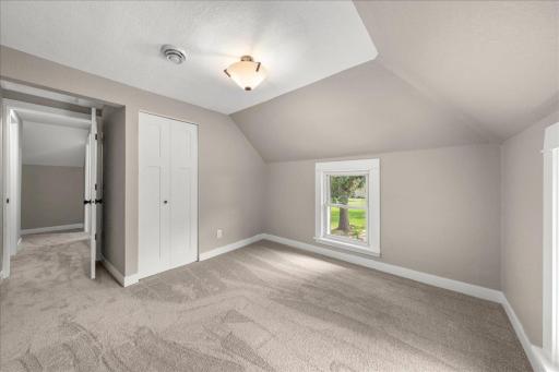 Additional view of 2nd bedroom looking back out into hallway.