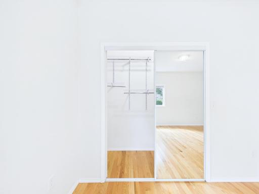 Master bedroom double mirror closet