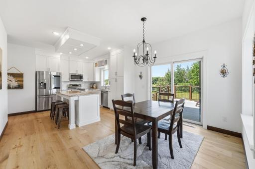 The heart of the home overlooks the private backyard with light bursting in.