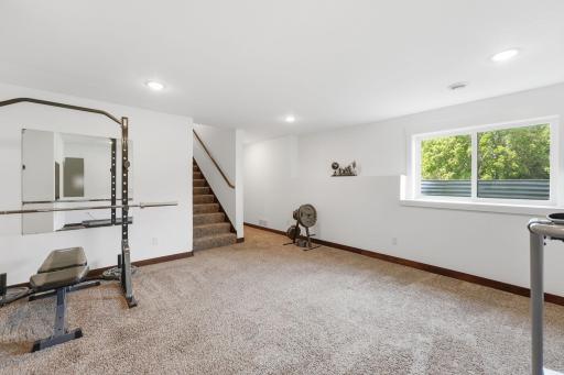 Light abounds in this lower level lookout basement.