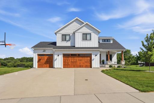 Spacious 3 stall insulated garage.