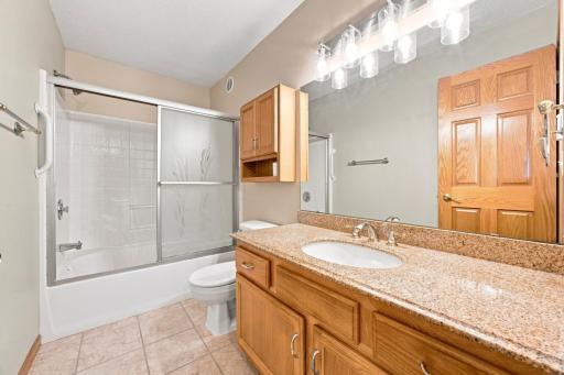 Upstairs Hollywood bath with stone countertops