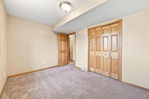 Bedroom #4 in lower level. Solid doors throughout!