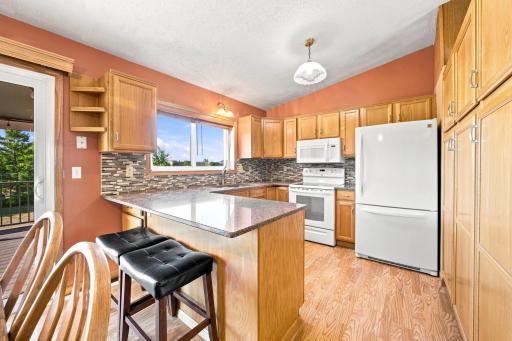 Kitchen features stone countertops