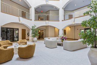 Open 3-story entrance with natural lighting above!