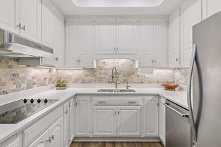Stainless steel refrigerator, dishwasher.