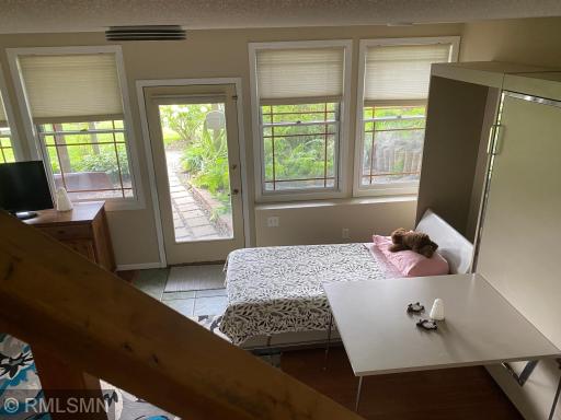 Lower-Level Living Room Walk-out Installed Murphy Beds