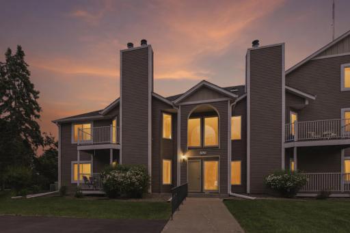 Exterior Entry and unit pictured. Main level corner unit pictured to the left of the main entrance.
