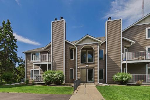 Building - Front Entry - unit is pictured to the left of the main entrance.