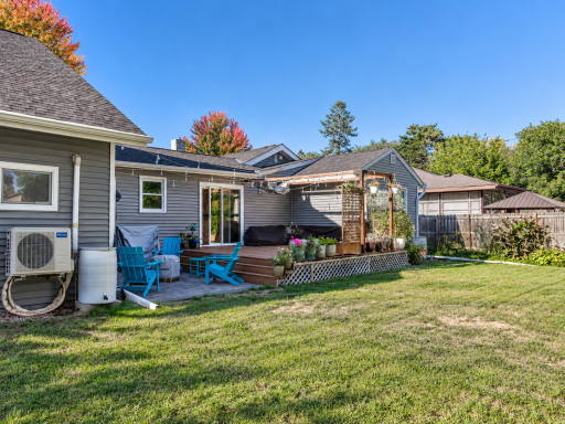 Backyard has room for relaxing, gardening, or outdoor activities.