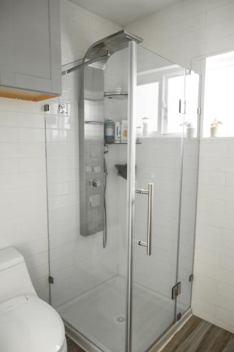 Walk-in shower completes the private primary bath.