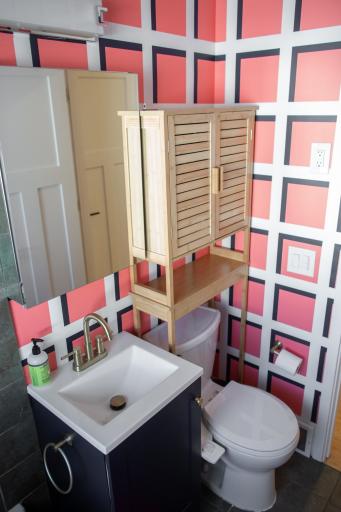 Extra bathroom storage makes good use of the space.