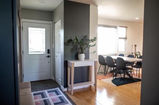 Entry opens naturally toward the dining and living areas.