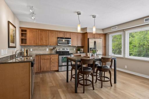 Amazing natural light throughout, overlooking the properties backyard.
