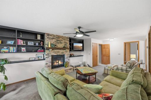 Lower Level Family Room with Wood Burning Fireplace
