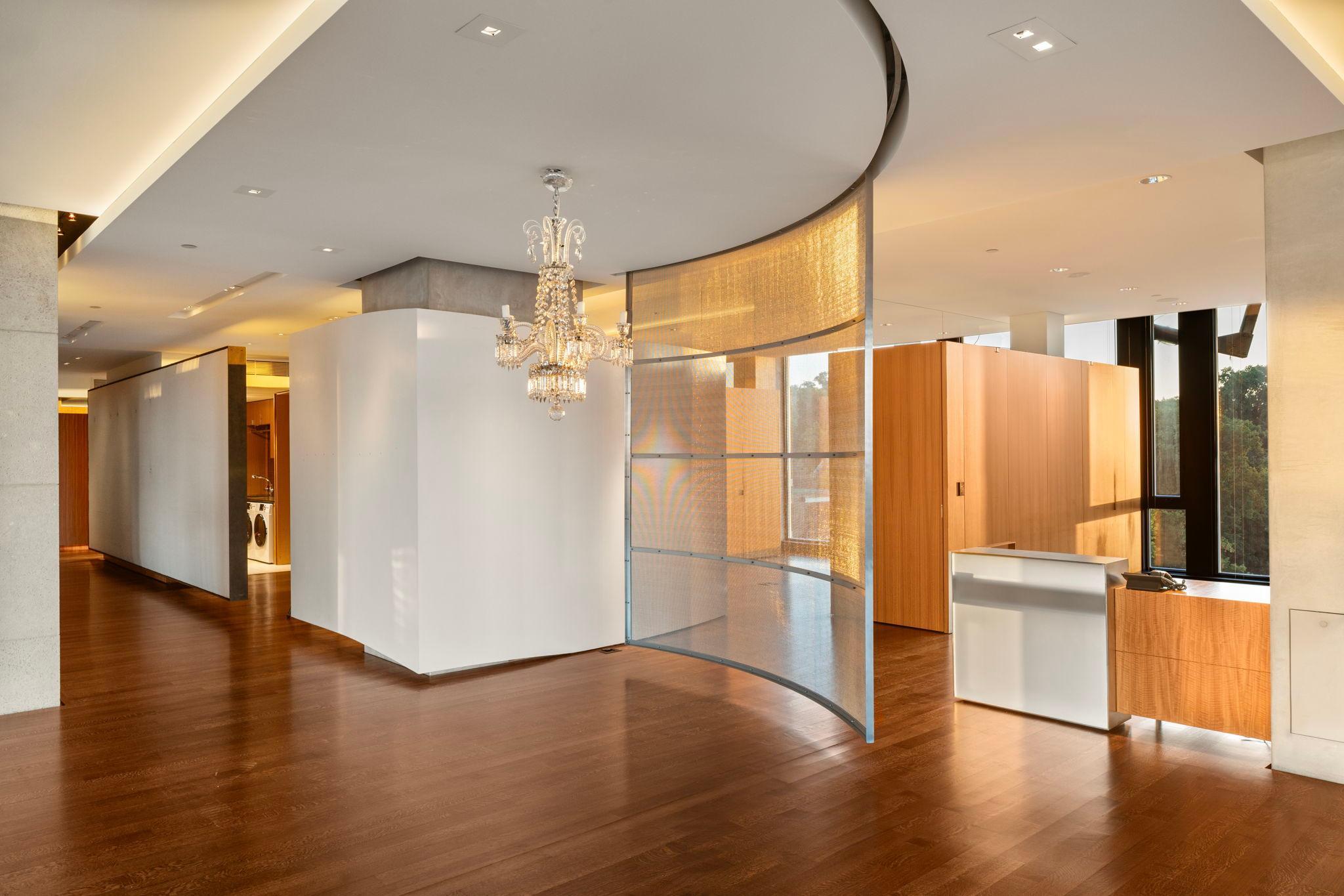 Movable screen designed to section off area within Great Room for a grand piano