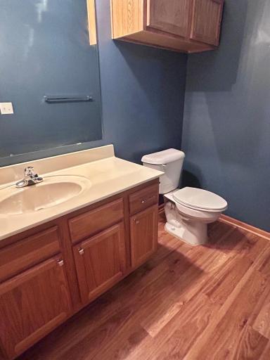 Main level bathroom located off of the kitchen.