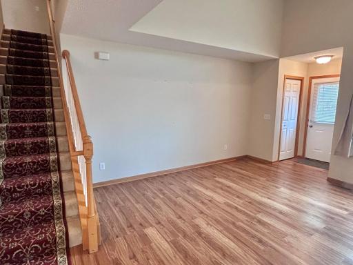Family room wall suitable for entertainment center.