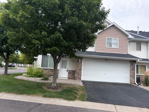 Front view of townhome. Double garage.