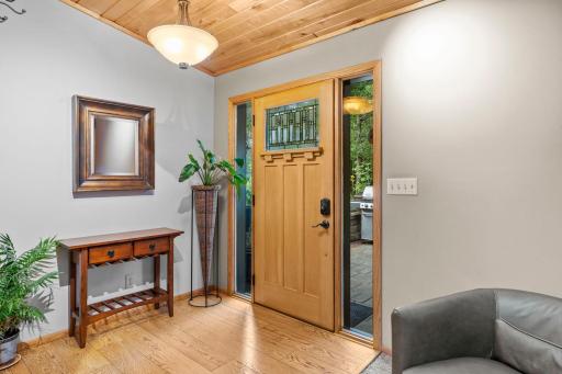 Inviting front entry with a beautiful front door