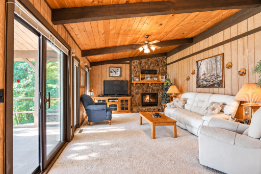 Living room. Photo enhanced by adding fire to wood burning fireplace.png
