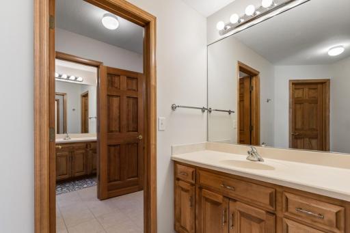 Full upper-level Jack-and-Jill bath conveniently connects two spacious bedrooms, offering privacy and functionality for family or guests.