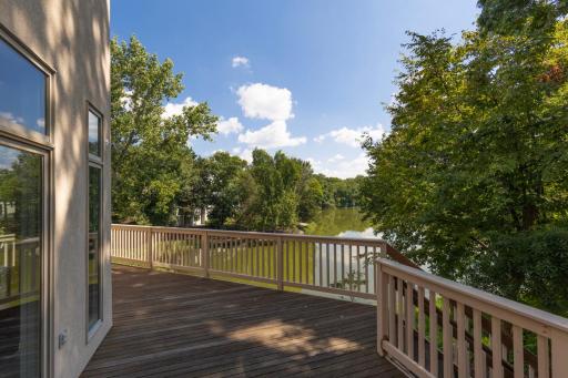 Expansive deck overlooking Turtle Pondâan ideal setting to relax, entertain, and enjoy the peaceful water views.