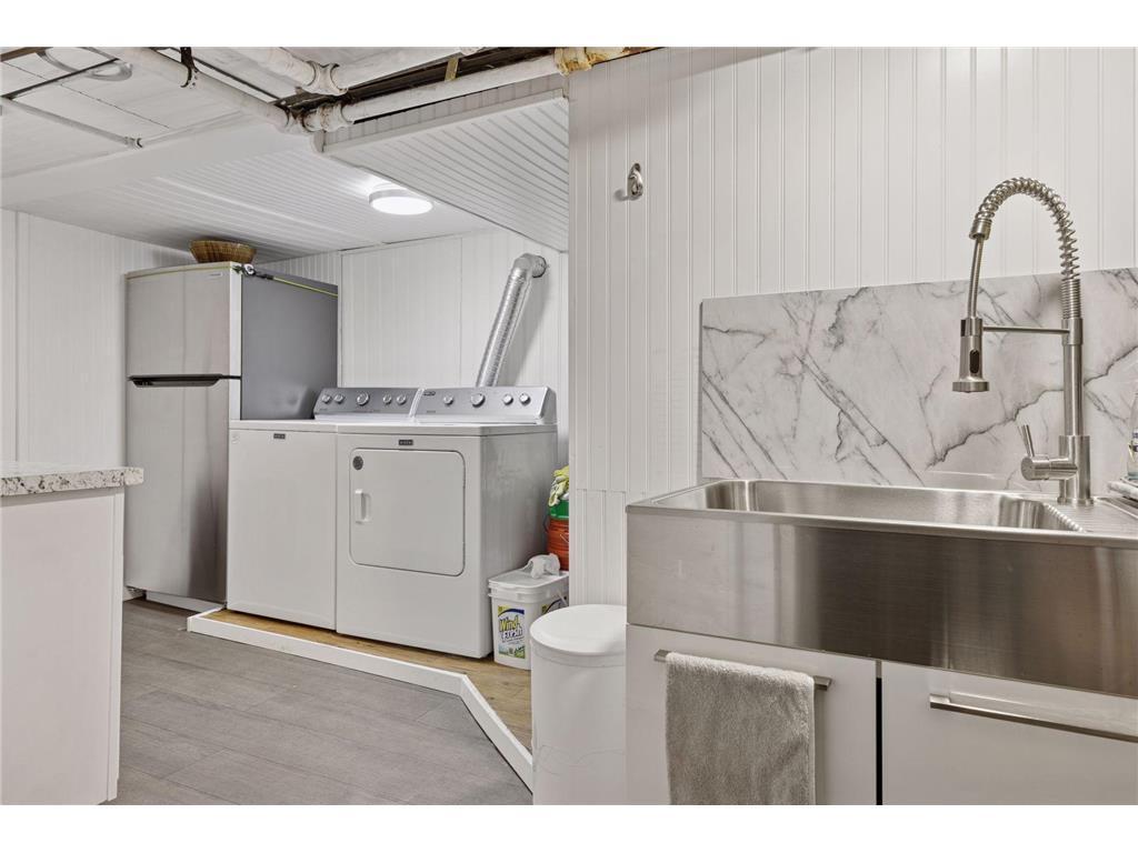Basement laundry and kitchen area.