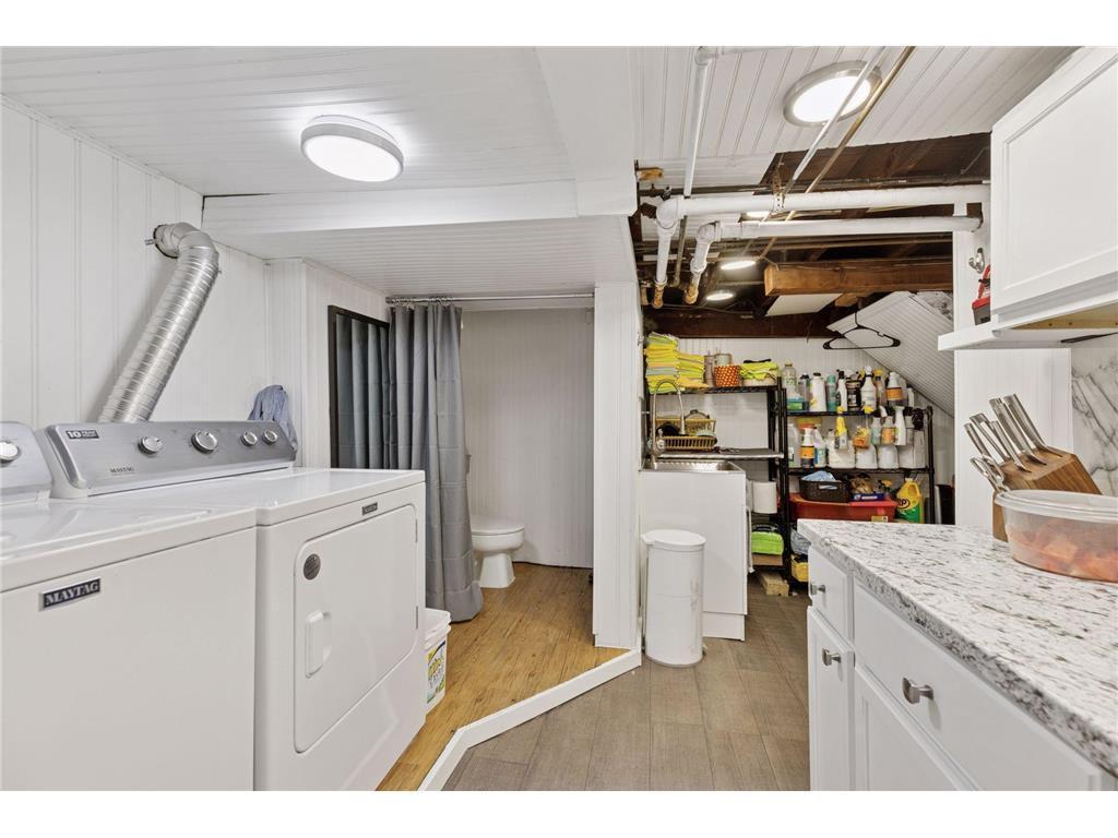Basement laundry and kitchen area.