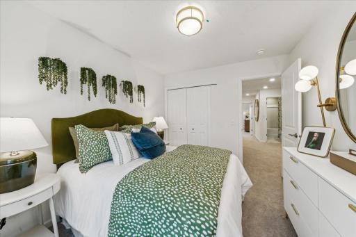 A thoughtfully designed secondary bedroom with a convenient closet and room for all your essentials. *Photo of a previously built home of the same floor plan. Finishes/options may vary.