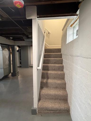 2955 Queen Stairs from lower level to main floor