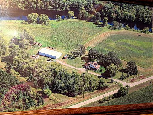 15.5 ACRE HOBBY FARM WITH LONG PRAIRIE RIVER FRONTAGE