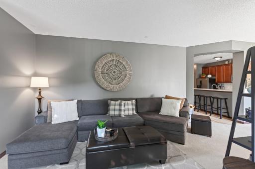 Main floor family room has plenty of space for entertaining.
